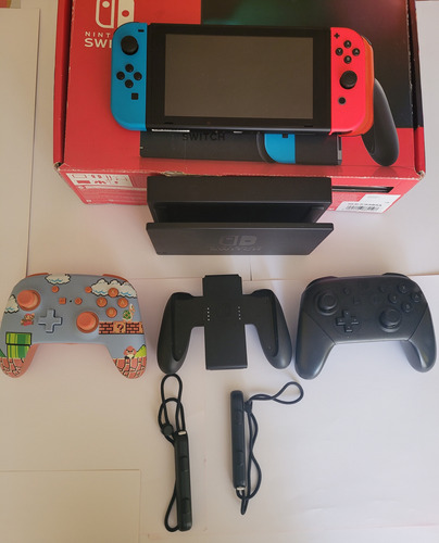 Consola Nintendo Switch Neon+ 3 Joystick + 2 Juegos Poco Uso