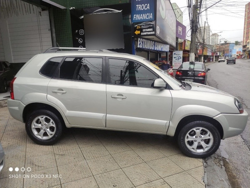 Imagem 10 de 10 de Hyundai Tucson 2014 2.0 Gls 4x2 Flex Aut. 5p
