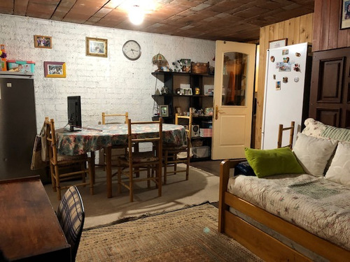Casa Muy Bien Tenida / Cerro 18 Sur