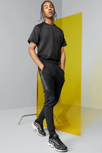 Pantalones nike hombre chupin hotsell
