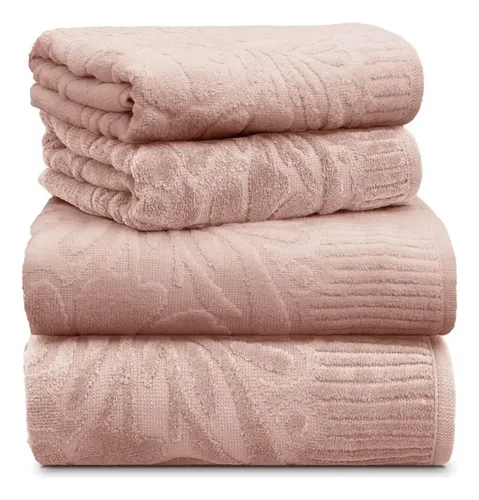 Conjunto de toalhas de banho dobradas em rosa