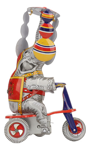Juguete Retro De Hojalata Con Forma De Elefante Sobre Tricic