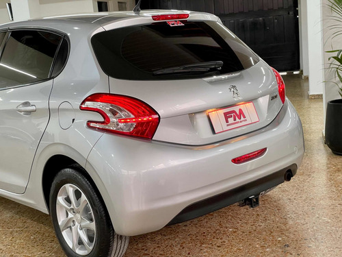 Imagen 9 de 25 de Peugeot 208 2014 1.5 Allure