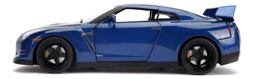 Coche Nissan con figuras de Rápido y Furioso con luz 1:18 Jada Color Azul