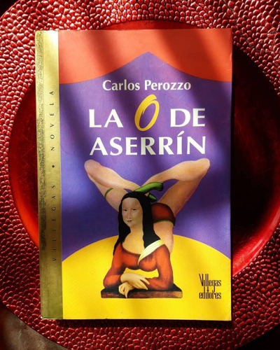 La O De Aserrín. Carlos Perozzo.