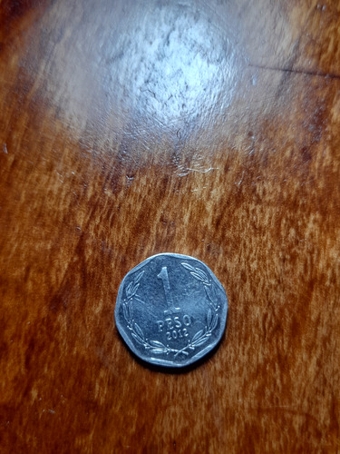 Moneda De Un Peso Chileno De 2012 