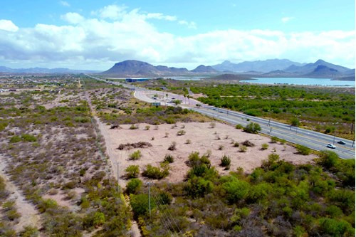 Terreno De 1 Hectárea Sobre El Blv Tetakawi Con Vista Parcial Al Mar
