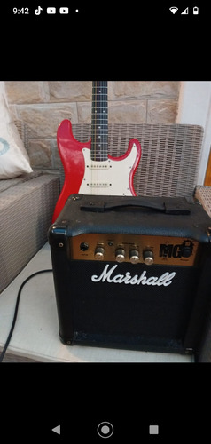  Guitarra Stratocaster, Púa, Faja, Amplificador Marshall 20w