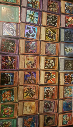 Yugioh Lata 100 Cartas (10 Foils)+obelisco Secret Gold+envío