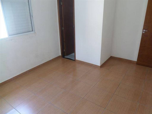 Imagem 7 de 30 de Sobrado Semi Novo Em São Vicente Com 02 Dormitorios E Quintal Em Condominio Bem Localizado - Hm2047