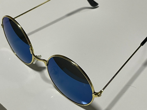 Gafas de sol redondas Motorhomestore con lente azul espejo y armazón dorado