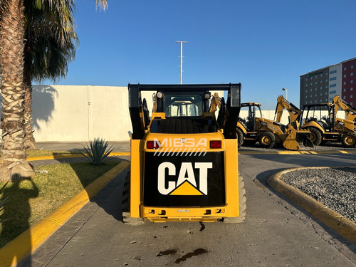 Minicargador Caterpillar/bobcat