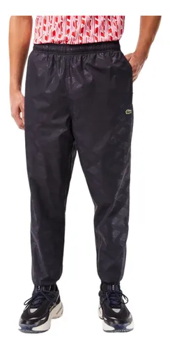 Pantalones rompevientos hombre new arrivals