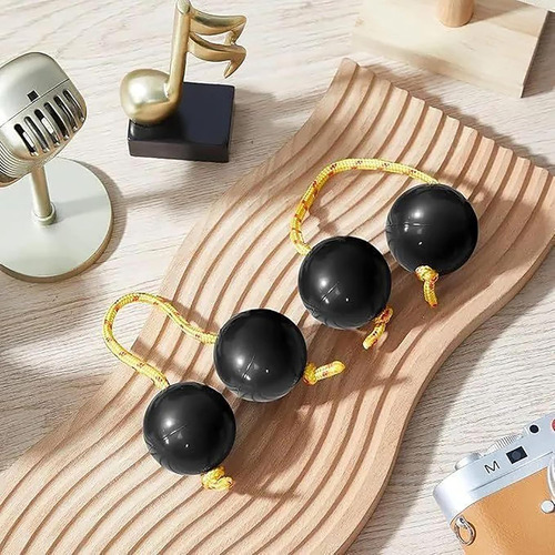Instrumentos Rítmicos De Percusión De Bolas Con Una Sola Man