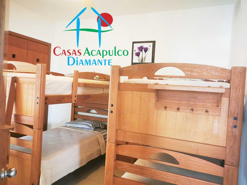 Cad Mayan Lakes 1-501. En Condominio Con Club De Playa. Terraza Con Vista A La Alberca Y Jardines