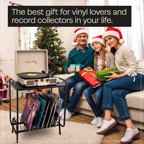 Tocadiscos elegante con disco de vinilo en la mesa