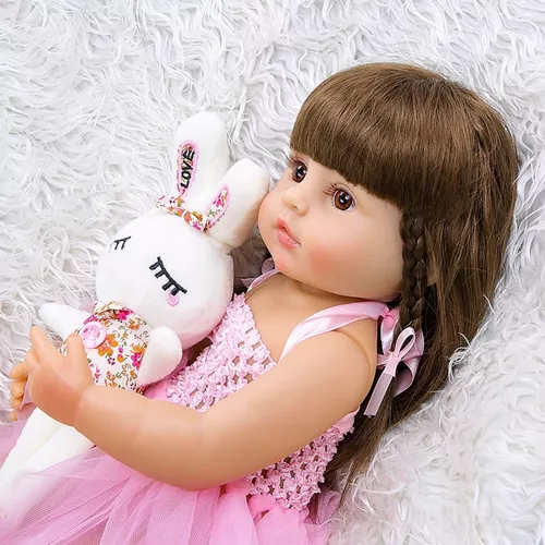 Boneca Bebê / Baby Reborn Menina em Silicone com Vestido de Coelho Rosa  Fofinha Muito Macia Flexível 48cm