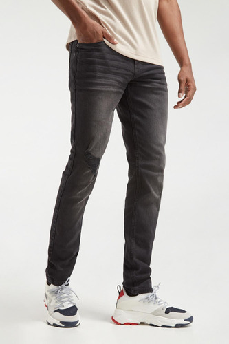 Jean Skinny Negro Con Tiro Bajo Y Roto En Pierna Derecha