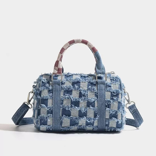 - Para A Bolso De Mezclilla Stitch Con Costuras Rasgadas /