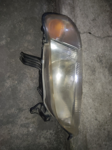 Faro Delantero Izquierdo Ford Laser 99