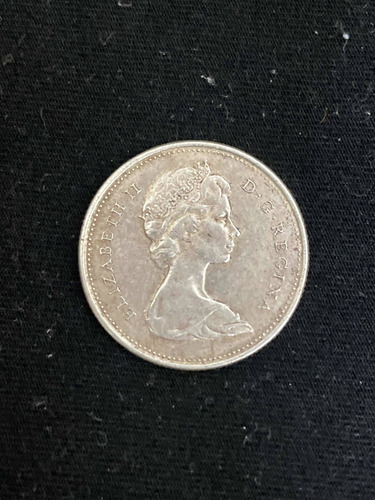 Imagen 2 de 2 de Moneda Canadiense Centenario