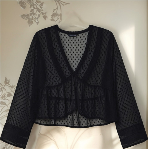 Camisa Sin Botones Stradivarius España. Plumeti