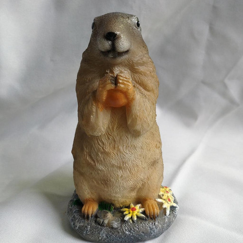 Apoyos De La Foto De La Escultura Del Jardín De La Marmota
