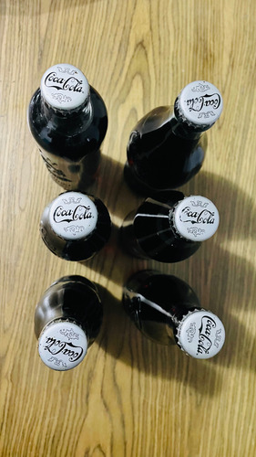 Colección De Botellas De Coca Cola