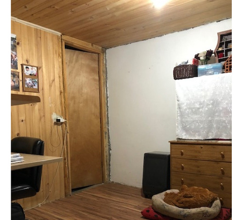Casa Muy Bien Tenida / Cerro 18 Sur