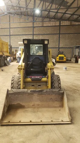 Mini Cargador Case 410 Modelo 2005