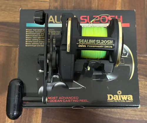 Reel Rotativo Daiwa Sealine Sl20sh Dos Usos Como Nuevo Negro Derecho (Usado)