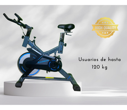 Bicicleta Spinning Fija President - Usuario 120kg - Disco De Inercia De 11 Kg - Estructura Robusta Y Resistente - Negro Y Celeste - Con Rueditas De Traslado, Niveladores De Piso Y Pedales Metalicos