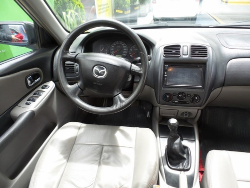 Juego De Manijas De Puerta Interna De Mazda Allegro