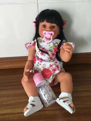 Boneca bebê reborn negra morena corpo silicone PODE DAR BANHO cheia de  acessórios