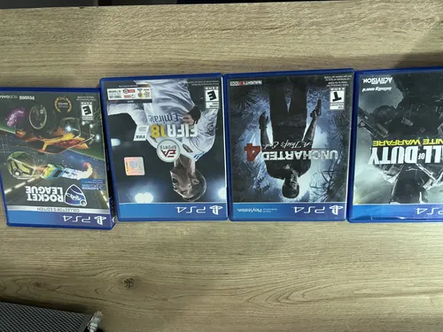 Play Station 4 Slim, 2 Controles + 4 Juegos (Usado)