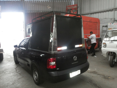 Imagem 7 de 8 de Food Truck Saveiro Lado De Fora(montagem Sem Veiculo )