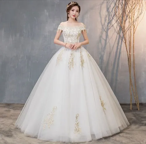 Vestido de noiva dourado e best sale branco
