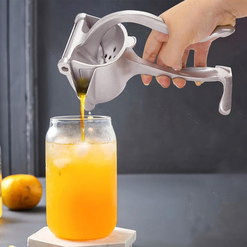 Exprimidor Manual De Jugos, En Aluminio Compacto Y Práctico