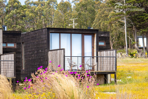 Parcela Con Inversión Turística De 4 Cabañas En Pichilemu