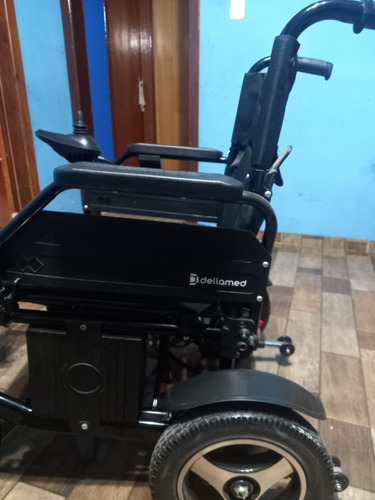 Cadeira De Rodas Motorizada. Paciente Não Se Adaptou.