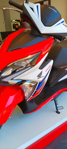 Imagen 2 de 16 de Honda Elite 125 Fi Tricolor Honda Redbikes