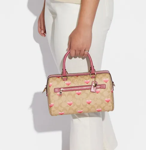 Bolsa coach rosa palo sale