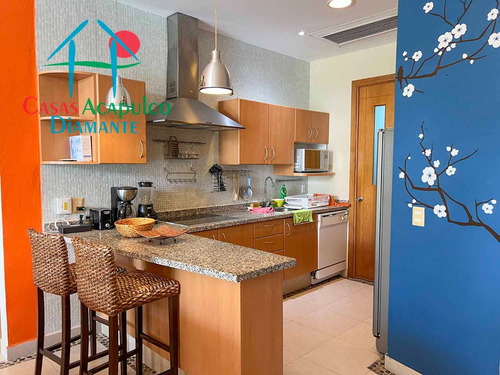 Cad Mayan Lakes 16 302. Amplia Terraza Con Vista A Las Áreas Comunes Y Acceso A Un Exclusivo Club De Playa