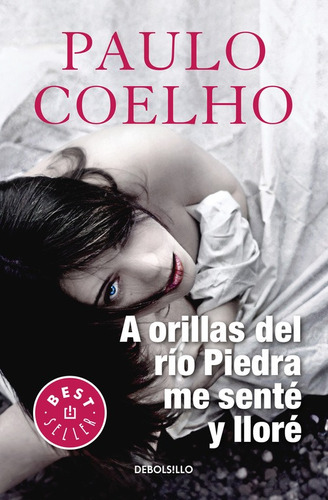 A orillas del Río Piedra me senté y lloré ( Biblioteca Paulo Coelho ), de Coelho, Paulo. Serie Bestseller Editorial Debolsillo, tapa blanda en español, 2017