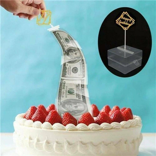 Imagen 3 de 8 de Pastel De Plata Tirando De La Caja De Pastel De Cumpleaños