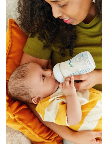 Imagen 8 de 10 de Set Recien Nacido Avent Natural 4 Mamaderas Chupete Cepillo