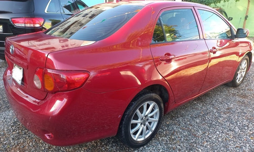 Imagen 8 de 9 de Toyota Corolla 2009 Rojo Metalico Impecable