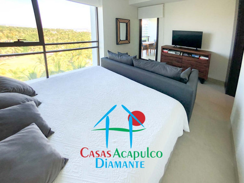 Cad La Isla Gran Caimán 604. Terraza Con Vista A Los Jardines Y Albercas