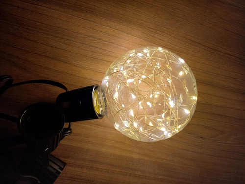 Imagen 3 de 4 de Bombillo Vintage Led Globo Tipo Luciernaga Color De La Luz Amarillo