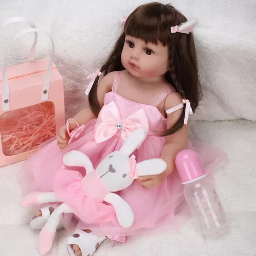 Boneca Reborn De Silicone Princesa de 55cm na cor Rosa Com Coelho De Pelúcia